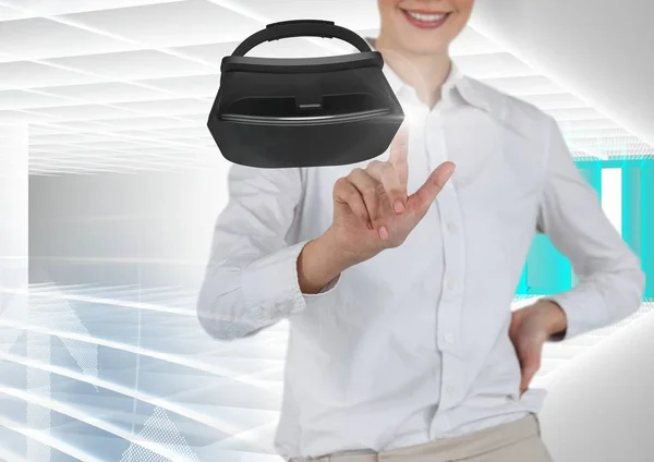 Woman touching virtual reality headset — Stock Photo, Image