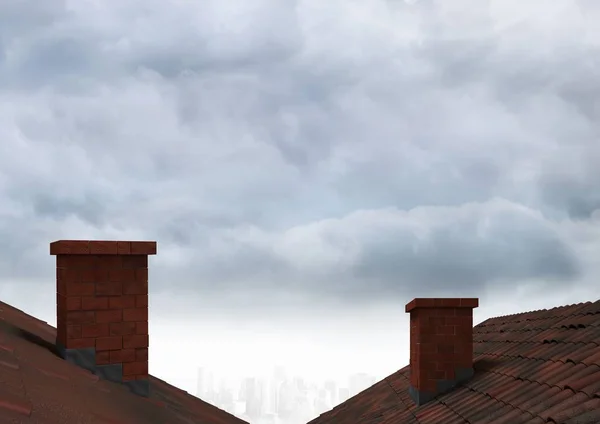 Telhados com chaminé e nuvens — Fotografia de Stock