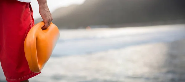 Man holding rescue buoy — Stock Photo, Image