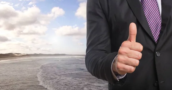 Podnikatel v přírodě beach — Stock fotografie