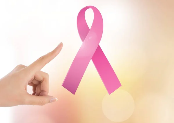 Mano di puntamento con nastro rosa per cancro al seno — Foto Stock