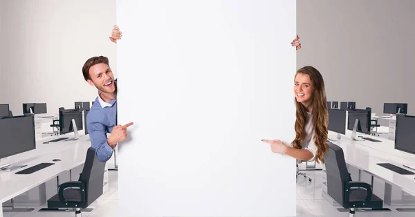 Business people holding blank card in office — Stock Photo, Image