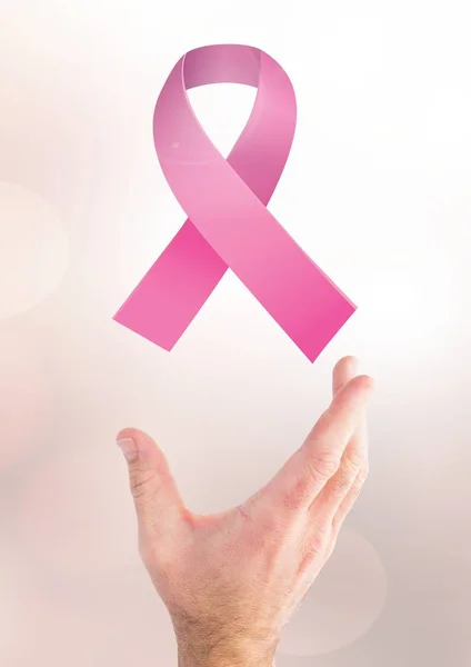 Open hand with pink ribbon — Stock Photo, Image