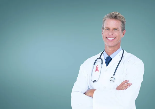 Doctor with breast cancer awareness ribbon — Stock Photo, Image