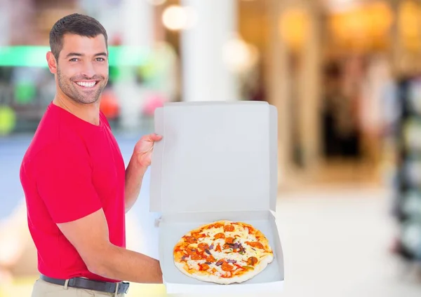 Levering man met pizza — Stockfoto