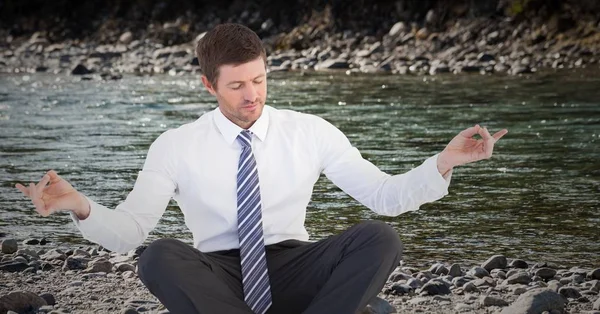 Business man meditating — Stock Photo, Image