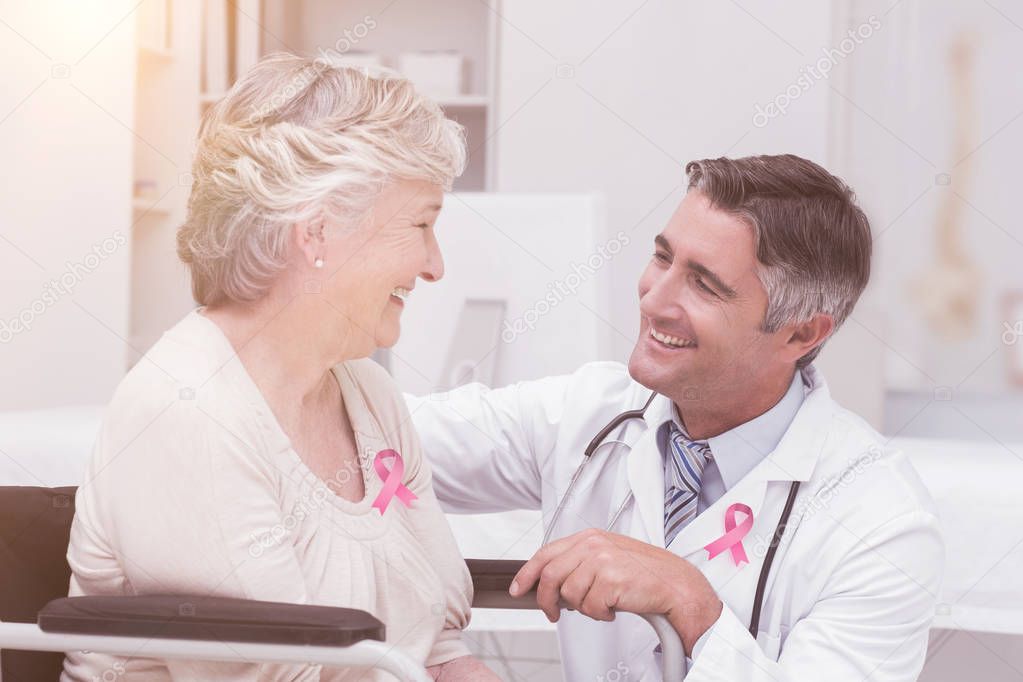 cancer awareness ribbon against doctor