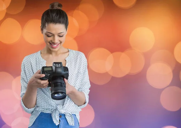 Photographer looking the photos — Stock Photo, Image