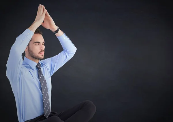 Business man meditating — Stock Photo, Image