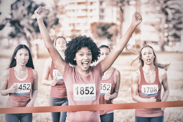 Woman winning breast cancer marathon — Stock Photo, Image