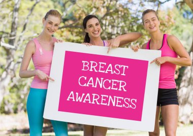 kart tutan metin ve pembe Meme Kanseri Bilinçlendirme kadınlar