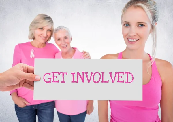 Související Text a ruka drží karty s růžové prsu rakoviny povědomí žen — Stock fotografie