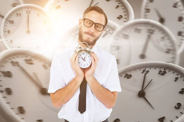 Geschäftsmann hält Wecker — Stockfoto