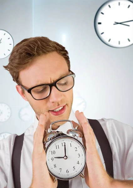 Business man holding a clock — Stock Photo, Image