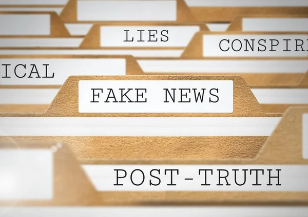 Fake news and associated words on files — Stock Photo, Image