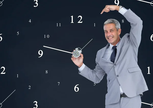 Homem de negócios segurando relógio — Fotografia de Stock