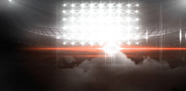 Прожекторы на стадионе с дымом — стоковое фото