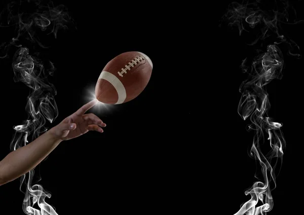 Dedo tocando futebol americano em fumaça — Fotografia de Stock