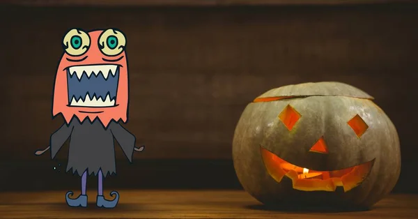 Kreskówek potwór obok halloween dynia — Zdjęcie stockowe