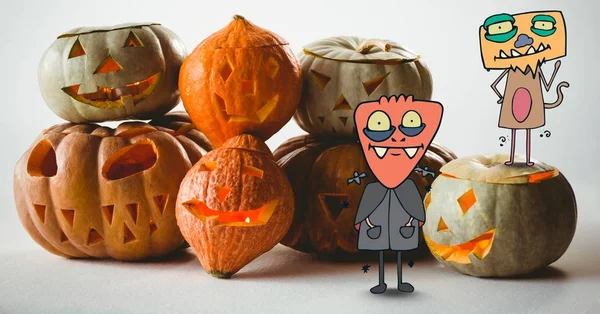Kreslených příšery s halloween dýně — Stock fotografie