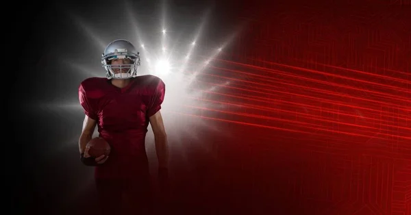 American football speler met stadion verlichting — Stockfoto
