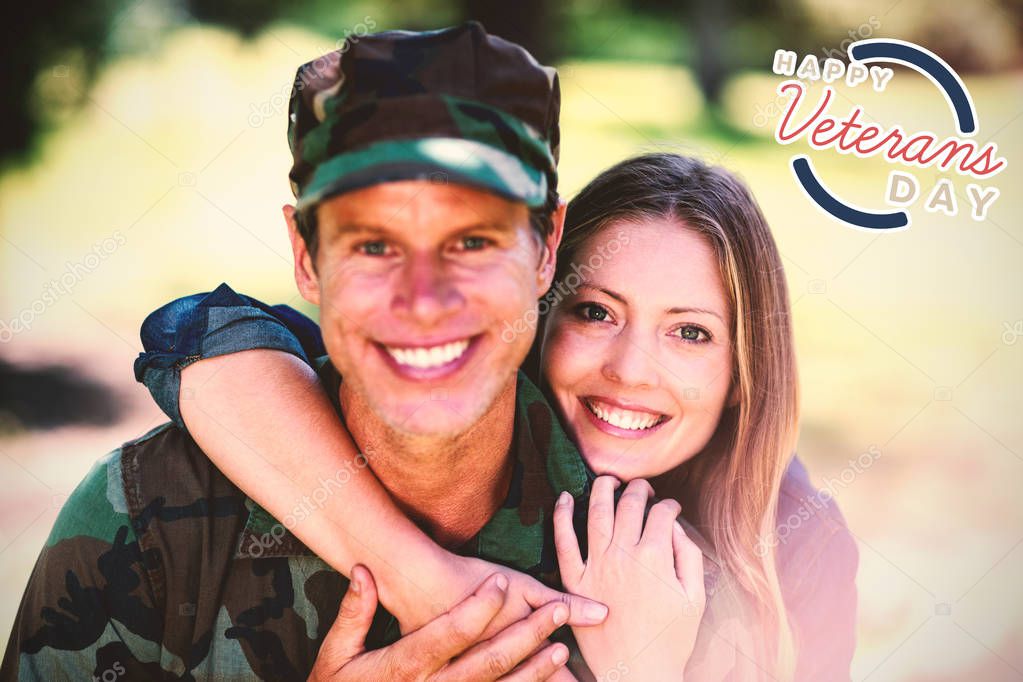 Logo for veterans day in america against smiling couple