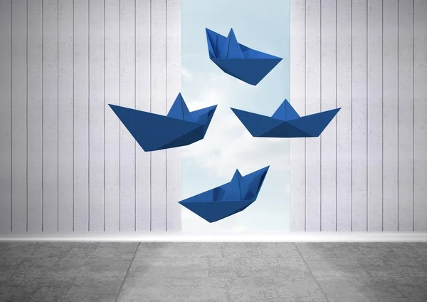 部屋に浮かぶ青い紙船 — ストック写真