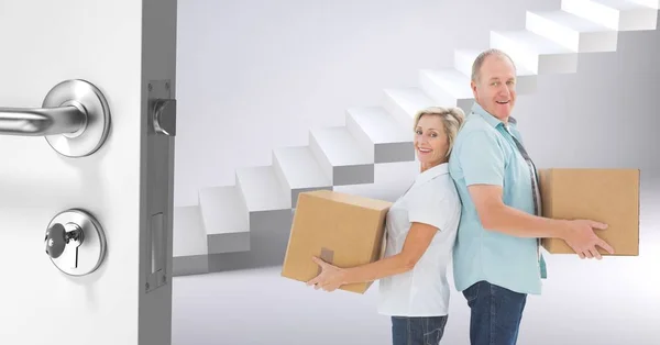 Pessoas mudando caixas para uma nova casa — Fotografia de Stock