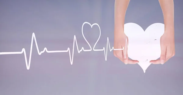 Heart beat over hands holding heart — Stock Photo, Image