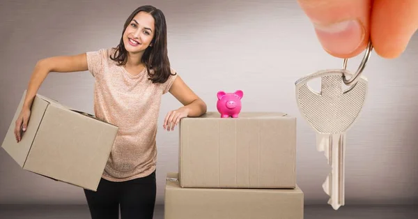 Mulher mover caixas para casa nova — Fotografia de Stock