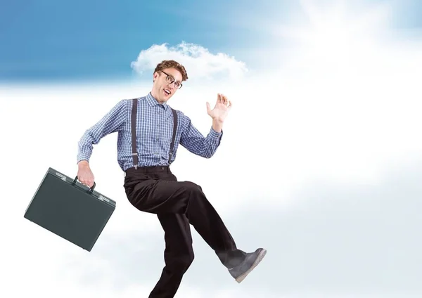 Businessman with briefcase in clouds — Stock Photo, Image