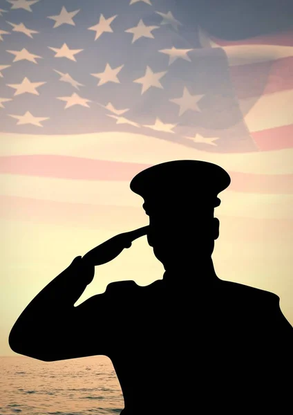 Veterans day soldier in front of flag — Stock Photo, Image