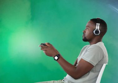 man playing with game controller clipart