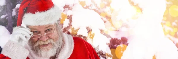 Santa with sparkling lights — Stock Photo, Image