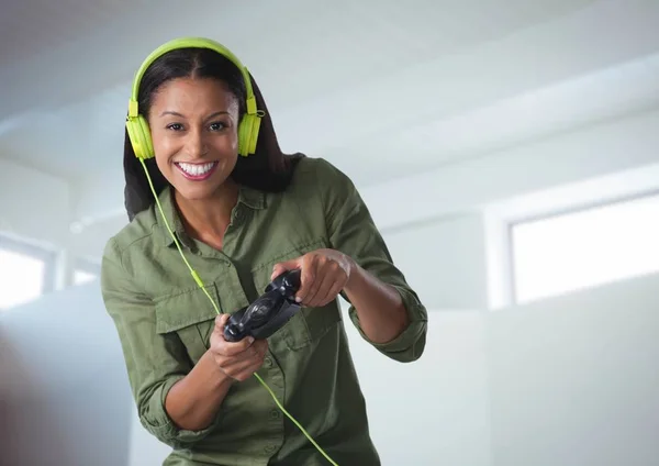 Woman playing with game controller — Stock Photo, Image