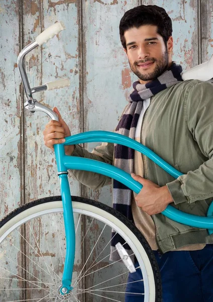 Człowiek z drewna z rowerem — Zdjęcie stockowe
