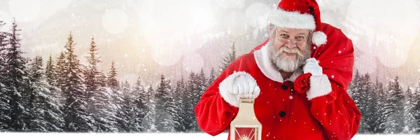 Santa segurando lanterna — Fotografia de Stock