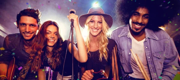 Smiling musicians at nightclub — Stock Photo, Image