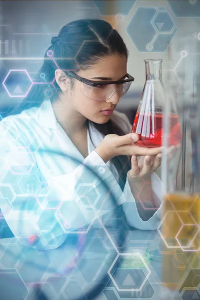 Schoolgirl doing a chemical experiment — Stock Photo, Image