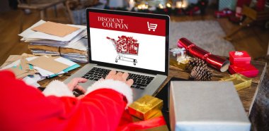 Noel Baba dizüstü kullanarak