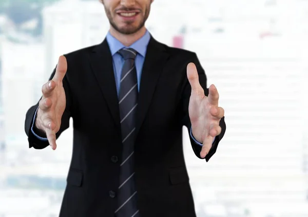 Businessman with hands palm open — Stock Photo, Image