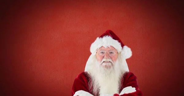 Weihnachtsmann mit rotem Hintergrund — Stockfoto