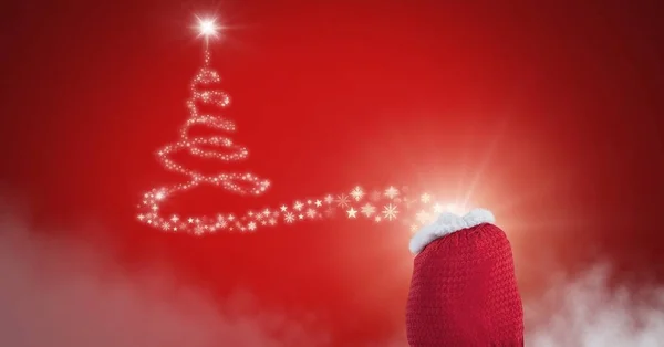 Santa's sack and Snowflake Christmas tree — Stock Photo, Image