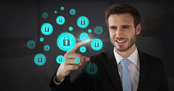 Businessman touching security lock icons — Stock Photo, Image