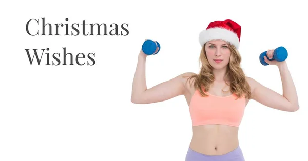 Noël souhaite texte et fitness femme soulevant des poids — Photo
