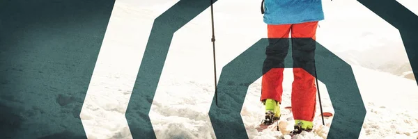 Skier walking on slope with ski — Stock Photo, Image