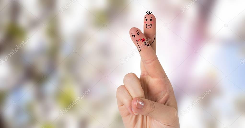 Digital composite of Valentine's fingers love couple and bright nature
