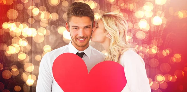 Attractive Young Couple Holding Red Heart Blurred Orange Light — Stock Photo, Image