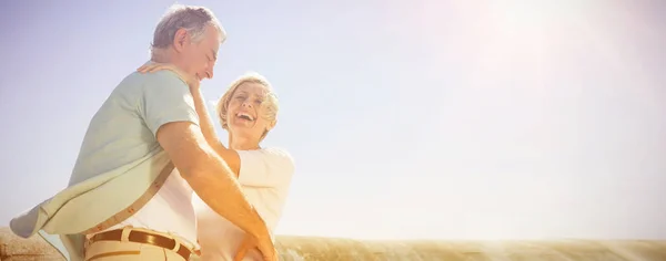 Senior Woman Hugging Her Partner Sunny Day — Stock Photo, Image