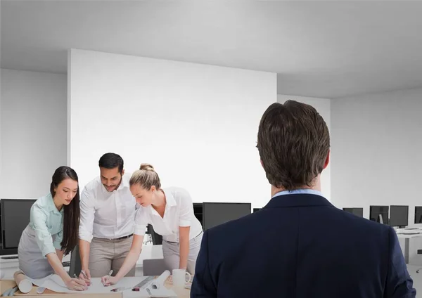 Digital Composite Business Man Facing Office While Coworkers Plan Project — Stock Photo, Image